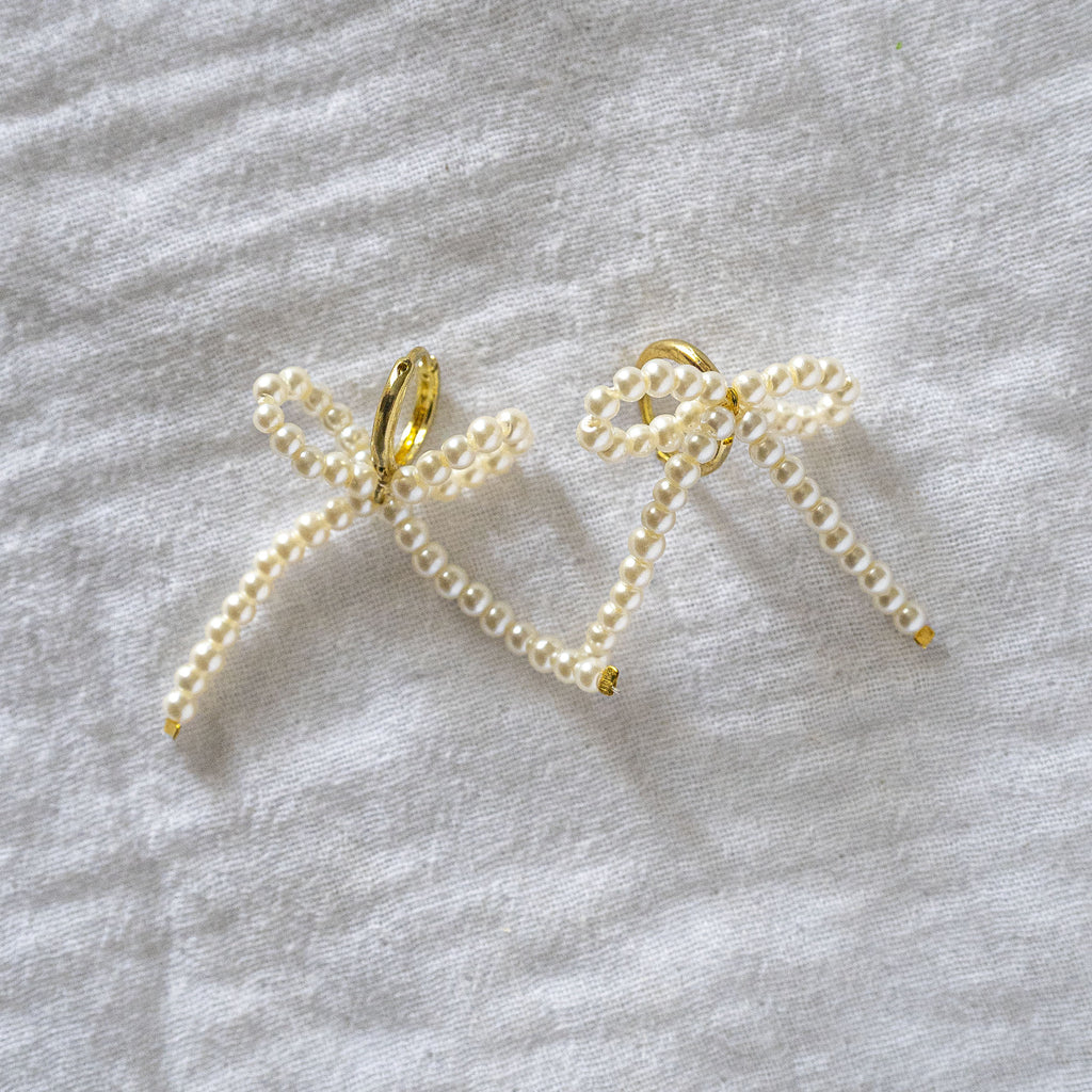 Delicate Pearl Beaded Bow Stud